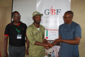 Isaac Odinaka receiving GEF 3 certificate
